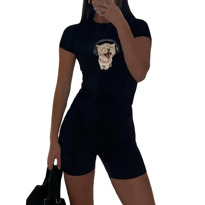 Person wearing a black outfit with a graphic design on a white background