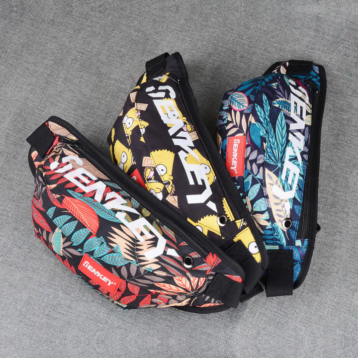 Two patterned bags with visible branding on a gray surface