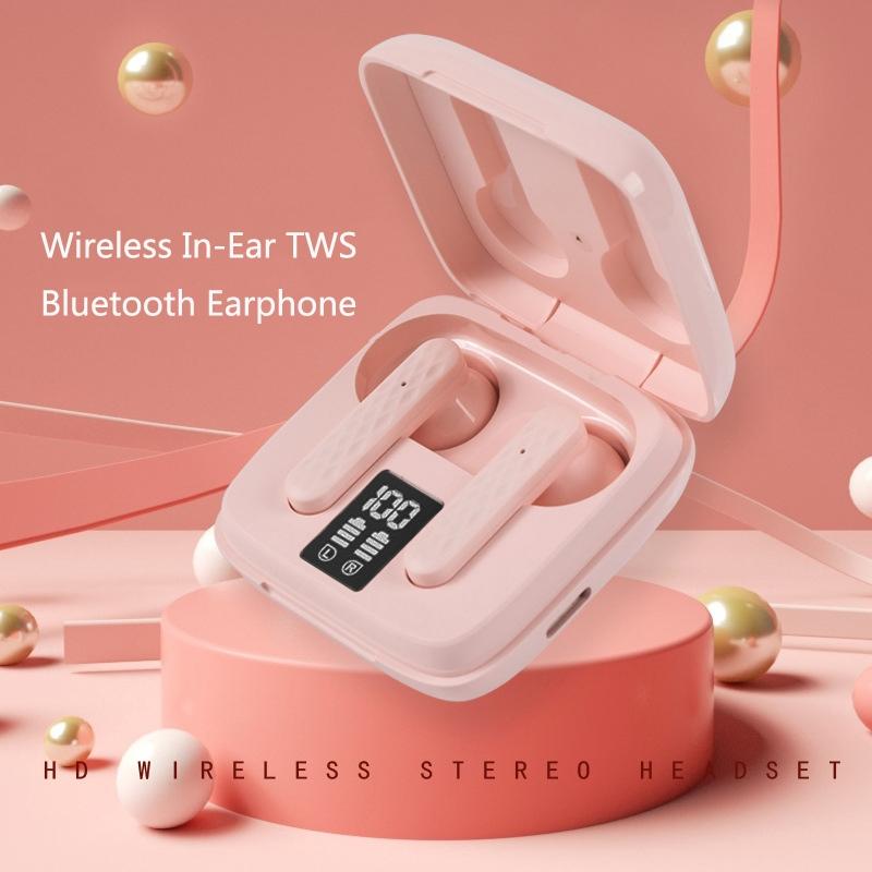 Wireless in-ear TWS Bluetooth earphones with charging case on a pink background