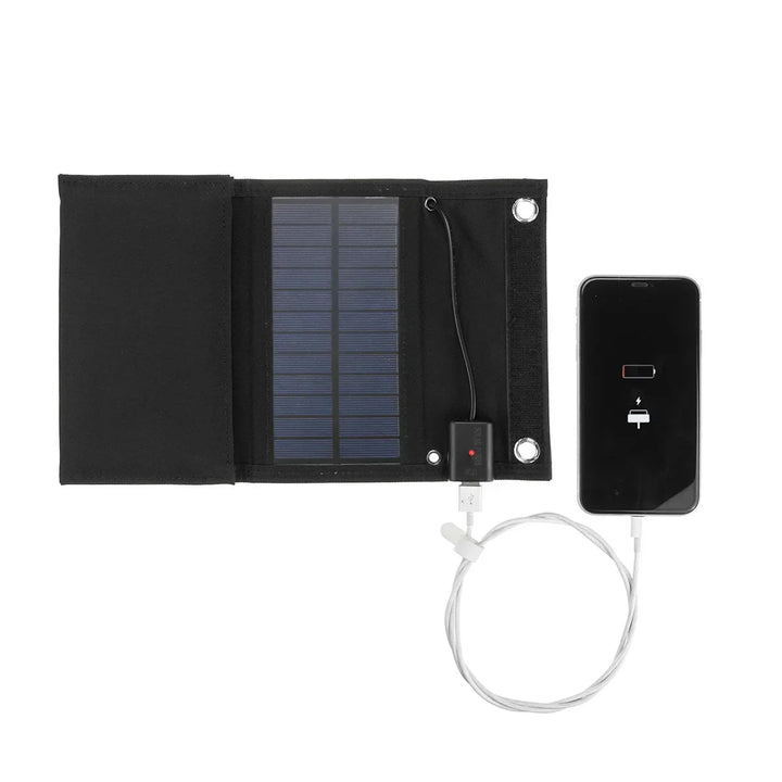 Foldable solar panel with charging cable and smartphone on a white background