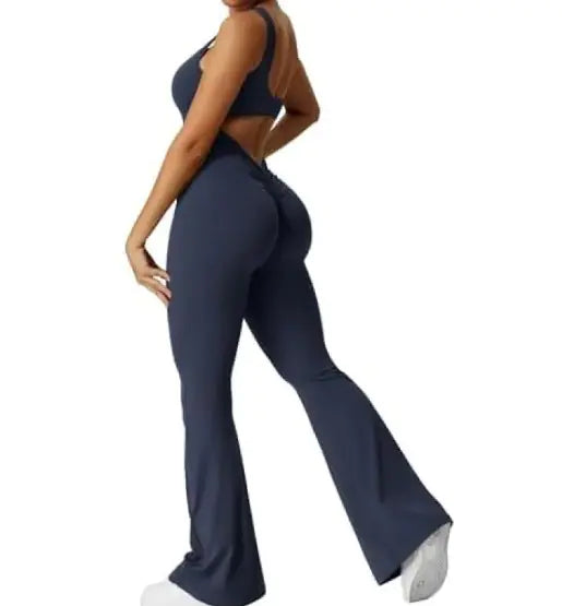 Navy blue jumpsuit worn by a person on a white background